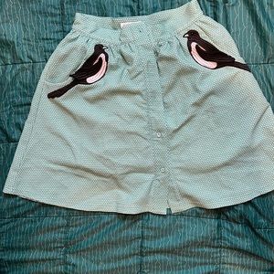 Button front bird pocket